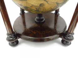 A stunning early 18 inch. celestial table globe in a unique stand.
